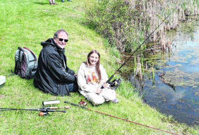 <b>James and Jamie Wakkile of Vernon are shown fishing.</b>