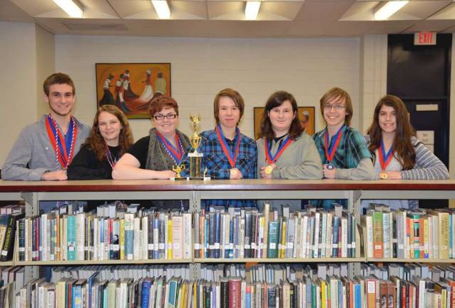 Winners from the Vernon Township High School Academic Decathlon team proudly show their medals, from left, Christopher Monschauer, Nicole Pirringer, Rebecca Stokem, Jacob Gehrig, John Allogio, Mathew Maass, and Alexis Margroff.