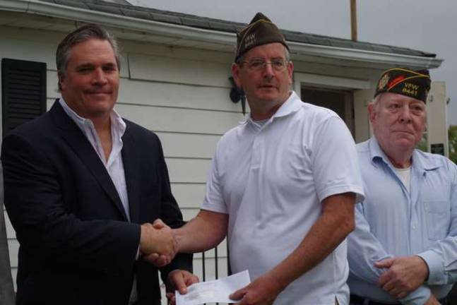 From the left are Crystal Springs Resort CEO Andy Mulvihill, VFW Quartermaster Bob Constantine, and VFW Chaplin and Past Commander Russ Thomas.
