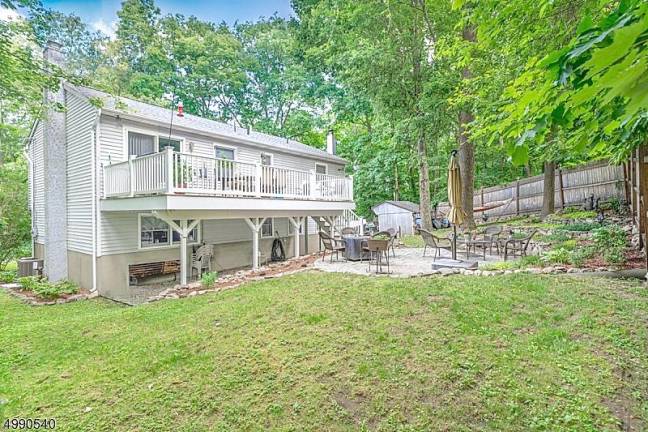 Embrace country life in this lake community home