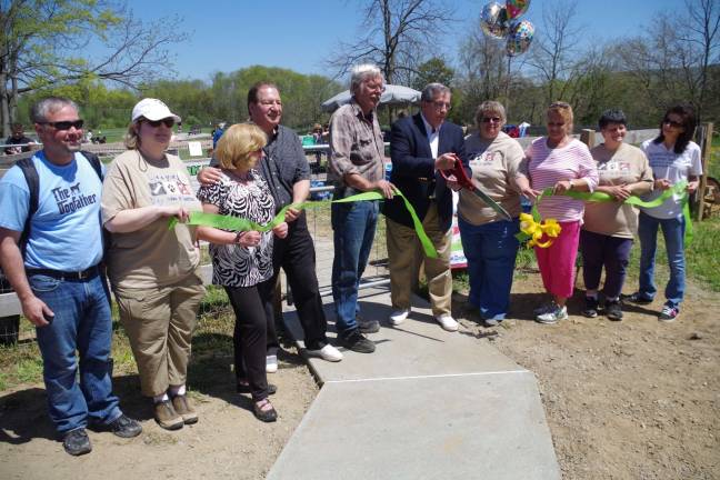 Members of DOGS at the ribbon cutting of the newly opened Vernon Dog Park with mayor Victor Marotta.