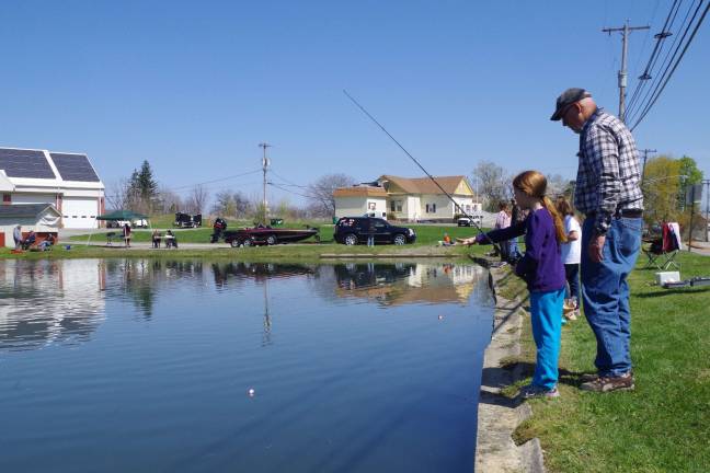 Nothing beats fishing with Grandpa. Reagan Hamilton, 9, of Vernon enjoyed a morning of fishing with her grandfather Caleb Williams of Shrewsbury, Pa.