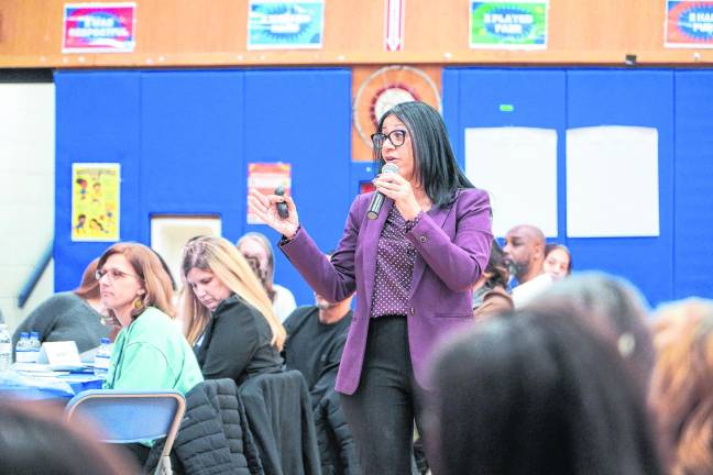 <b>Vernon Township Superintendent Eveny de Mendez speaks to stakeholders.</b>