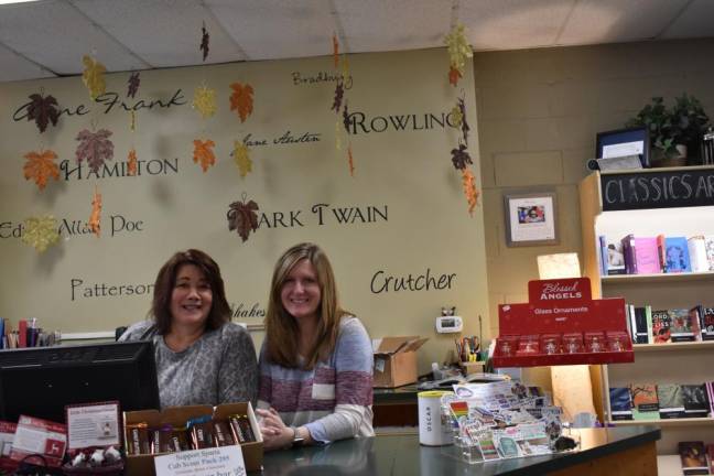 Jennifer Carlson (right) the new owner of Sparta Books, has leaned on Susan Perricone, a longtime employee.