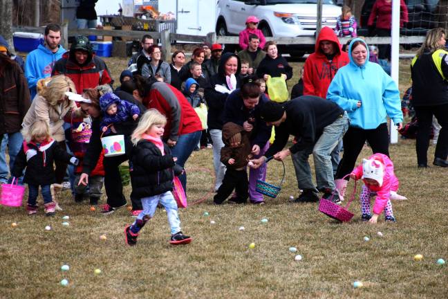 PHOTO BY GALE MIKO An Easter egg hunt at Woodbourne Park on Saturday, March 28.