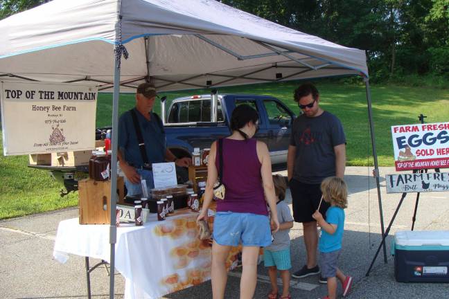 [Top of the Mountain Honey Bee Farm offered healthy, raw honey]