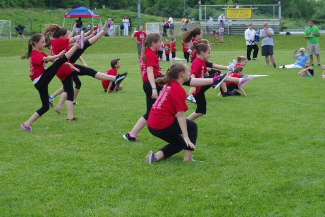 Members of Simply Dance drew a great many fans to the edge of the field for their demonstrations.