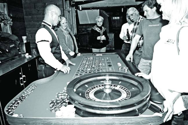 Attendees of Hidden Valley Ski Patrol's Casino Night tried their luck on a professional roulette wheel.