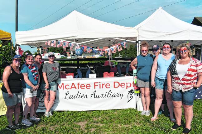 <b>The McAfee Fire Dept. Ladies Auxiliary poses for a photo.</b>