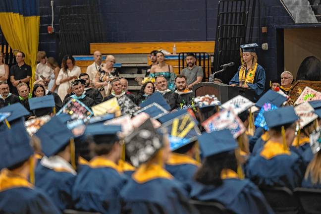 <b>Valedictorian Noelle Hernandez speaks to the graduates.</b>
