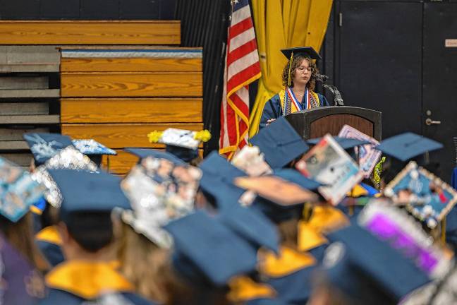 <b>Senior class president Chloe DeBonta speaks during the ceremony.</b>