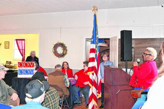 Lee Ellison, director of marketing and media at the Karen Ann Quinlan Hospice, speaks at the Veterans Welcome Home Day lunch. (Photos By Maria Kovic)