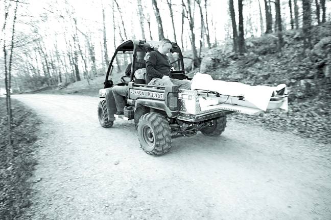 The Gator drives back to the staging area of Wawayanda State Park.