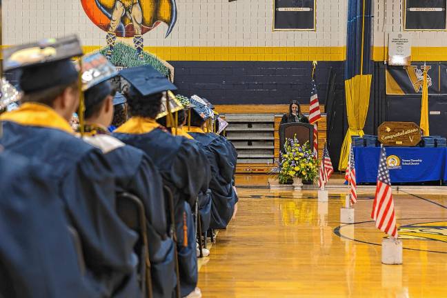 <b>Principal Lindsay LeDuc Young speaks to the graduating class.</b>