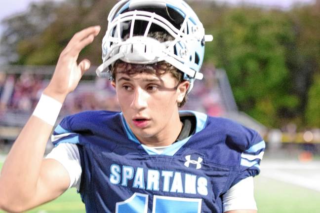 <b>Sparta quarterback Shane Hoover up close. He passed for 253 yards.</b>