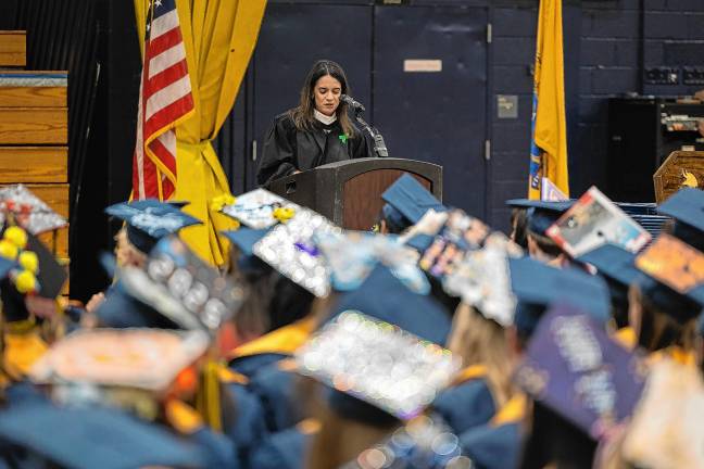 <b>Principal Lindsay LeDuc Young speaks to the graduating class.</b>