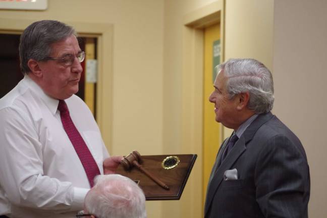 Photo by Chris Wyman Vernon Mayor Victor Marotta presents 2013 Township Council President Patrick Rizzuto with a plaque honoring his year of leadership.