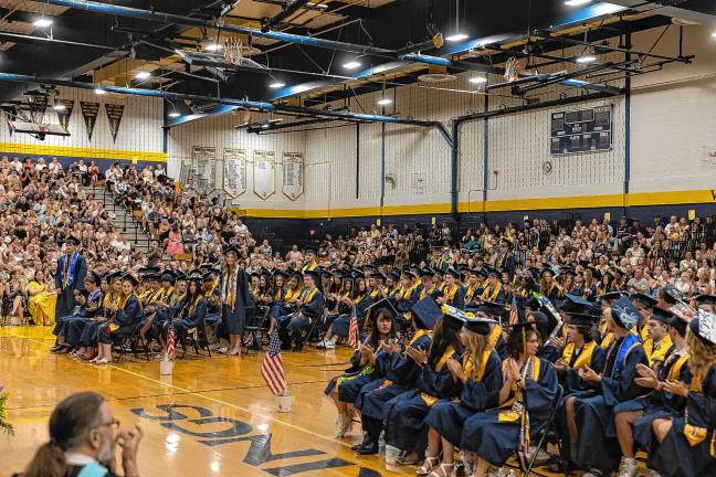 <b>Members of the Vernon Township High School Class of 2025 who are joining the military stand to be recognized during graduation.</b>