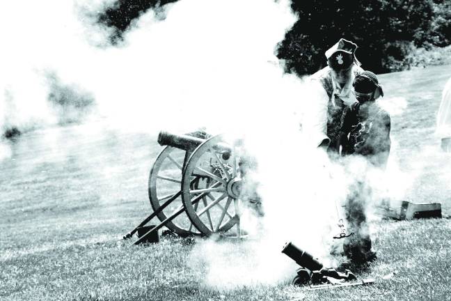 The smart ones cover their ears as the mortar fires a wad of grass clippings far into the woods behind the school.