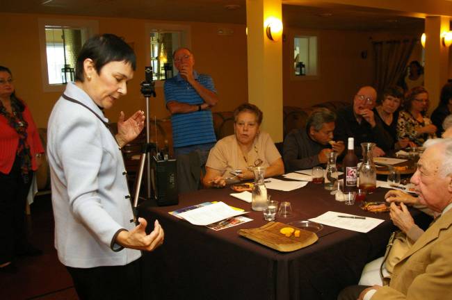 Photos By Chris Wyman Sparta resident Sylvia Montero talks about beating the odds at the Cava Winery in Hardyston.