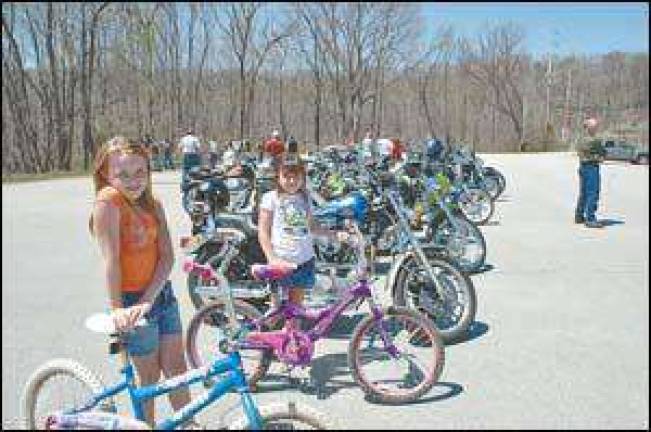 Blessing of the bikes , riders and a dog