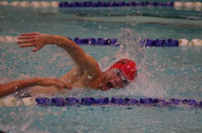 A Newton-Lenape Valley swimmer on the move in the pool.