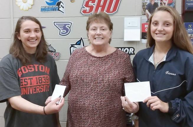 Vernon Township Woman's Club Education Chair Valerie Seufert (center) congratulates Stephanie DeMattheis (left) and Rachel Givens (right) who were selected to attend the Girls Career Institute at Rutgers University