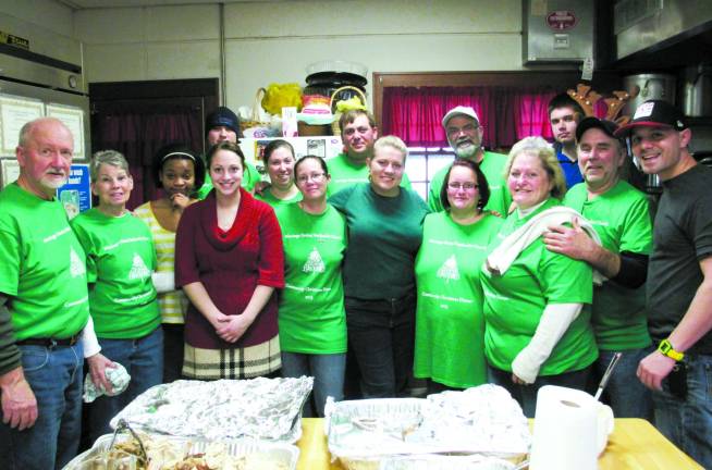 Photo by Viktoria-Leigh Wagner Volunteers at the Wantage United Methodist Church's third annual Christmas Dinner are shown.