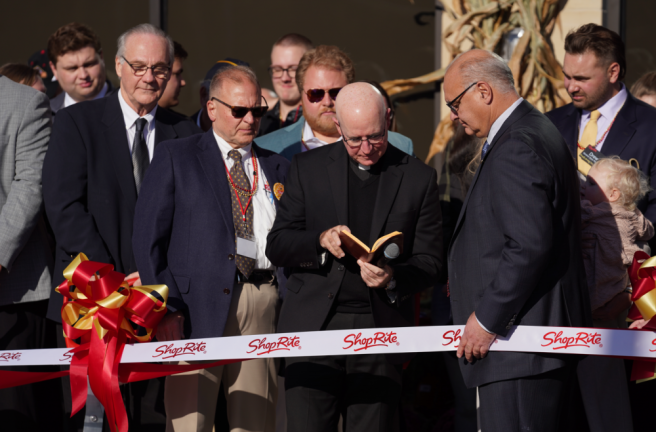 Father Brian Sullivan offers a prayer during the grand opening. (Photo courtesy of ShopRite of Sussex)