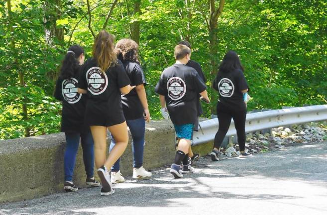 Some Final Round students walk home from Heater's Pond in their new tee-shirts (Photo by Vera Olinski)