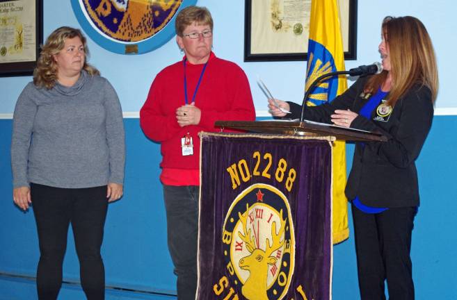 Elks Exalted Ruler Patty Green (right) introduces Veterans Administration representatives of the Montrose and Lyons VA hospitals.