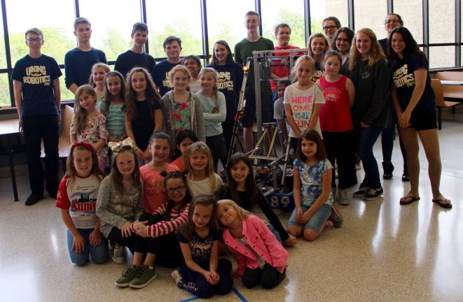 Young Girl Scouts spent an exciting morning with the Robotics Team at Vernon Township High School learning how to operate and build a robot for their Robotics badge.