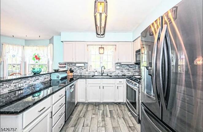 Center Hall Colonial in Orchard Estates