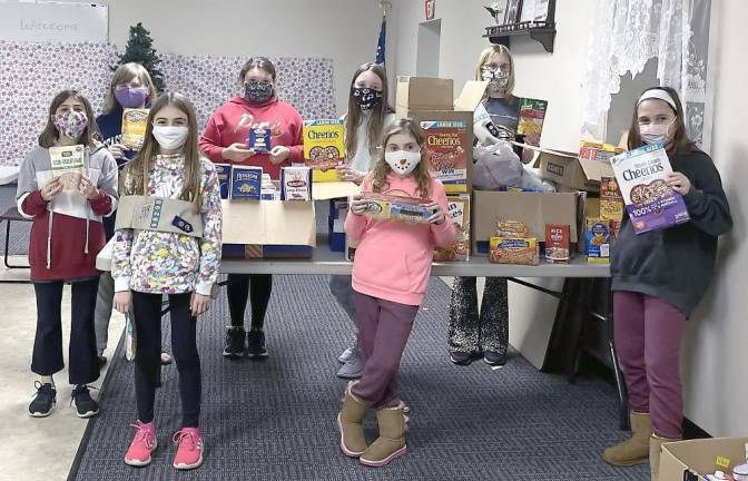 Wantage Girl Scouts collect for the food pantry
