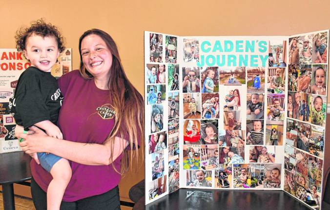 <b>McKenzie and Caden Dunn pose for a photo.</b>