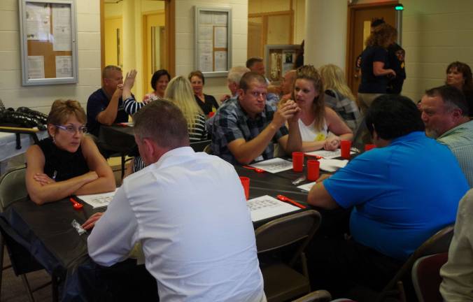 Guests wait patiently for the start of the buffet and jail tour.