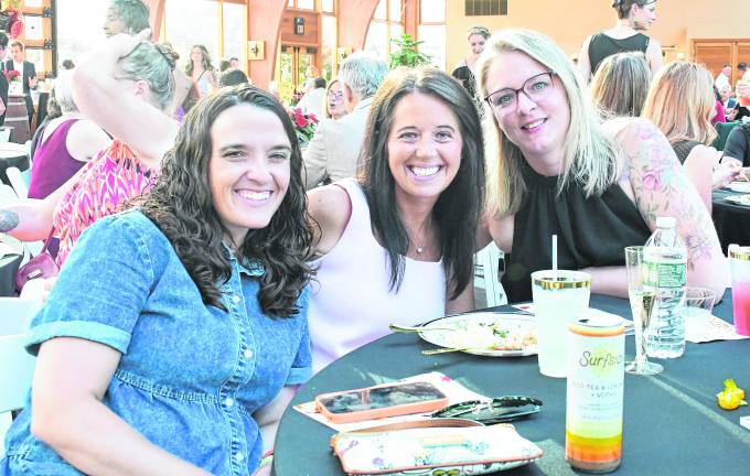 <b>Tiffany Izzi, Kerri Babus, all of Hampton pose for a photo.</b>
