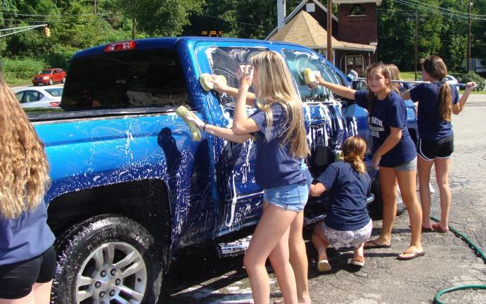 Vernon Cheerleaders Hold Benefit Car Wash