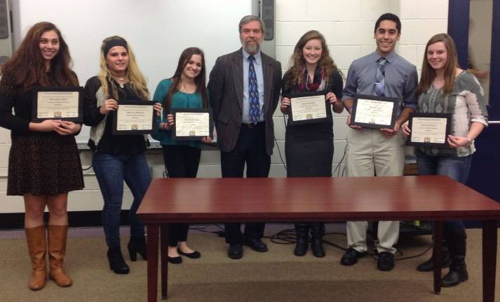 Pictured are, from left, Samantha Drew, Harley Rubenacker, Christina Flowers, Mr. Chorney, Emily Garofalo, A.J. Rodriguez, and Alexis O'Connell.