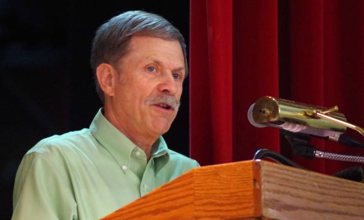 Longtime Sussex Rural Electric Cooperative Chairman Jack Haggerty addresses the audience of SREC members.