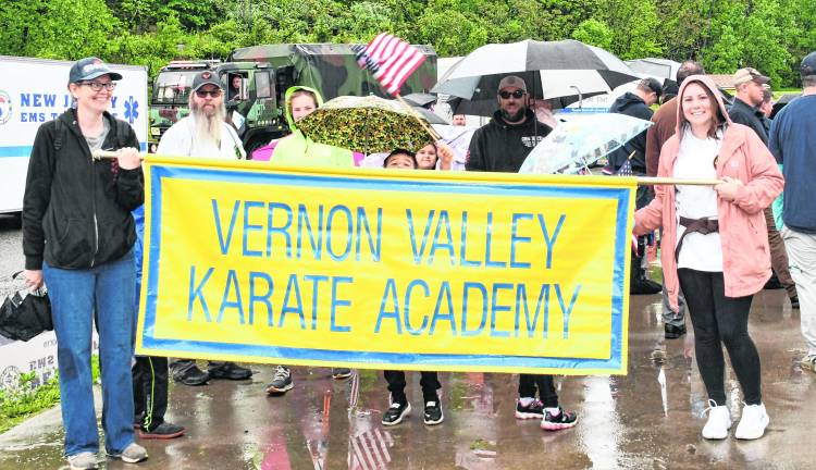 <b>Members of Vernon Valley Karate Academy march in the parade.</b>