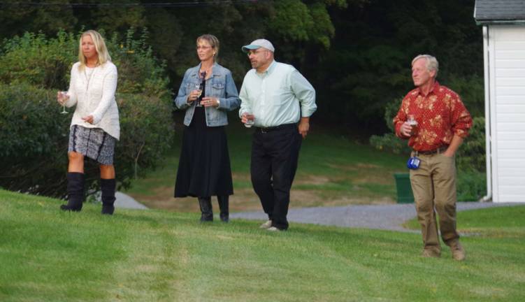 With beer and wine glasses in hand, visitors were able to explore the extensive flower and sculpture gardens of Meadowburn Farm.