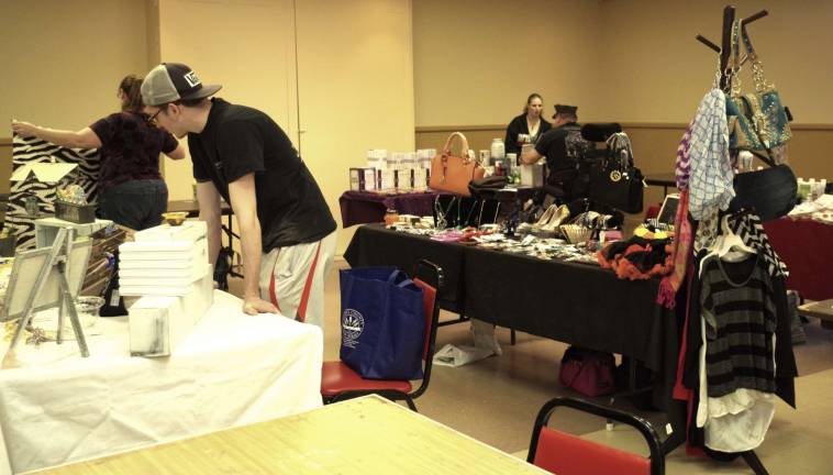 Vendors are shown in the rear dining room of the Vernon VFW during their fundraising sale on Saturday.