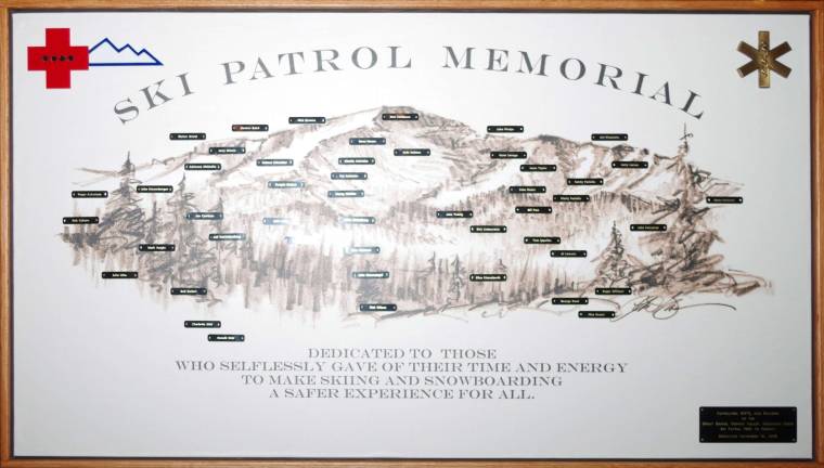 PHOTO BY CHRIS WYMAN A detailed image of the Ski Patrol Memorial Plaque unveiled Saturday evening at Mountain Creek on Nov. 14.