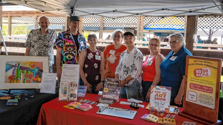 <b>The Sussex County Arts &amp; Heritage Council table.</b>