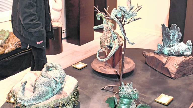 <b>Makennah Torppey of Branchville looks at art.</b>