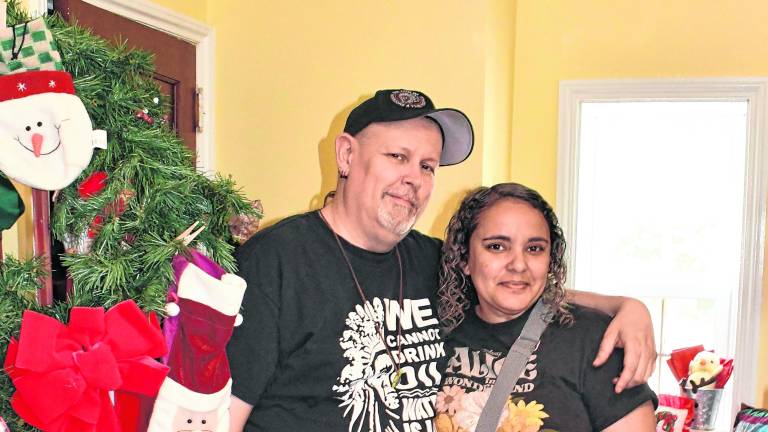 <b>Melody Alberti and Josh Godberg, both of Sussex, shop for Christmas.</b>
