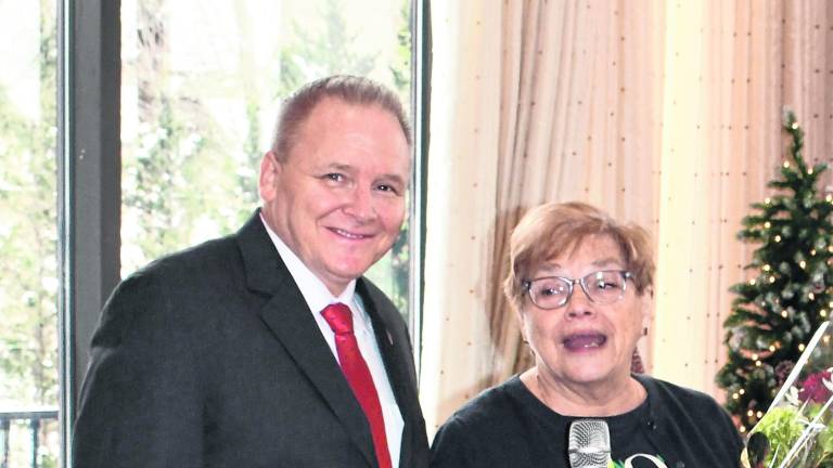 <b>Sharon Fitch was named the Senior of the Year on Dec. 15. She's shown with Vernon Township Mayor Anthony Rossi.</b>