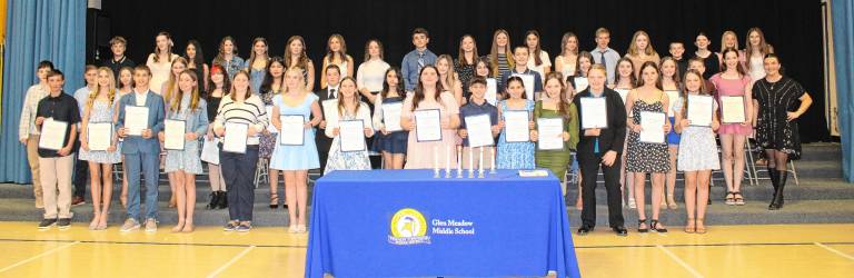 <b>Thirty-one seventh- and eighth-graders are inducted into the Glen Meadow Middle School chapter of the National Junior Honor Society on April 2. (Photo provided)</b>