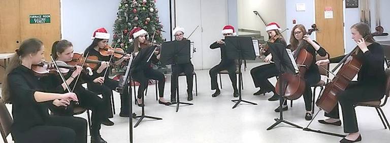 String ensemble plays for woman's club